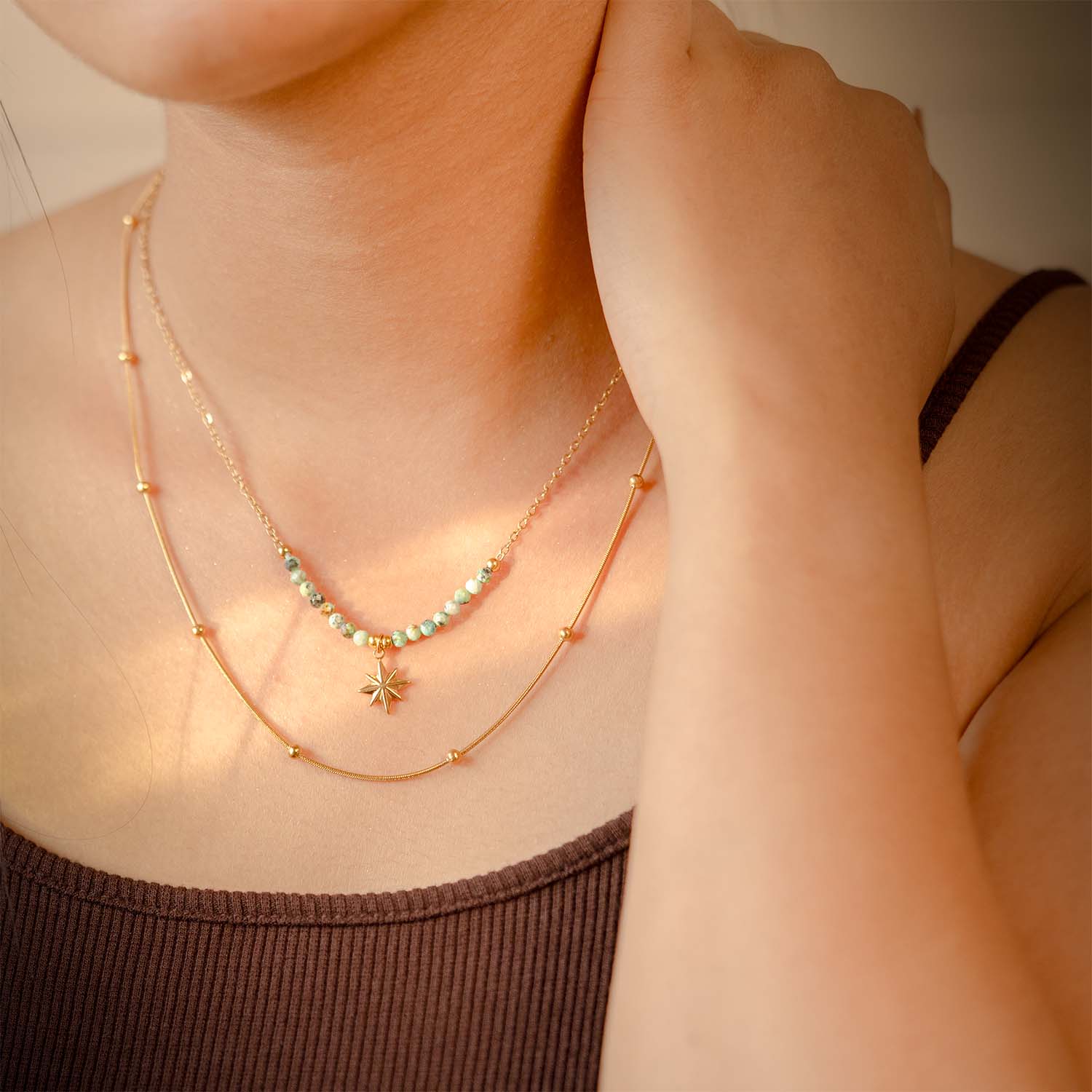 Astra Multi-Layer Gold Star Necklace with Emerald Beads