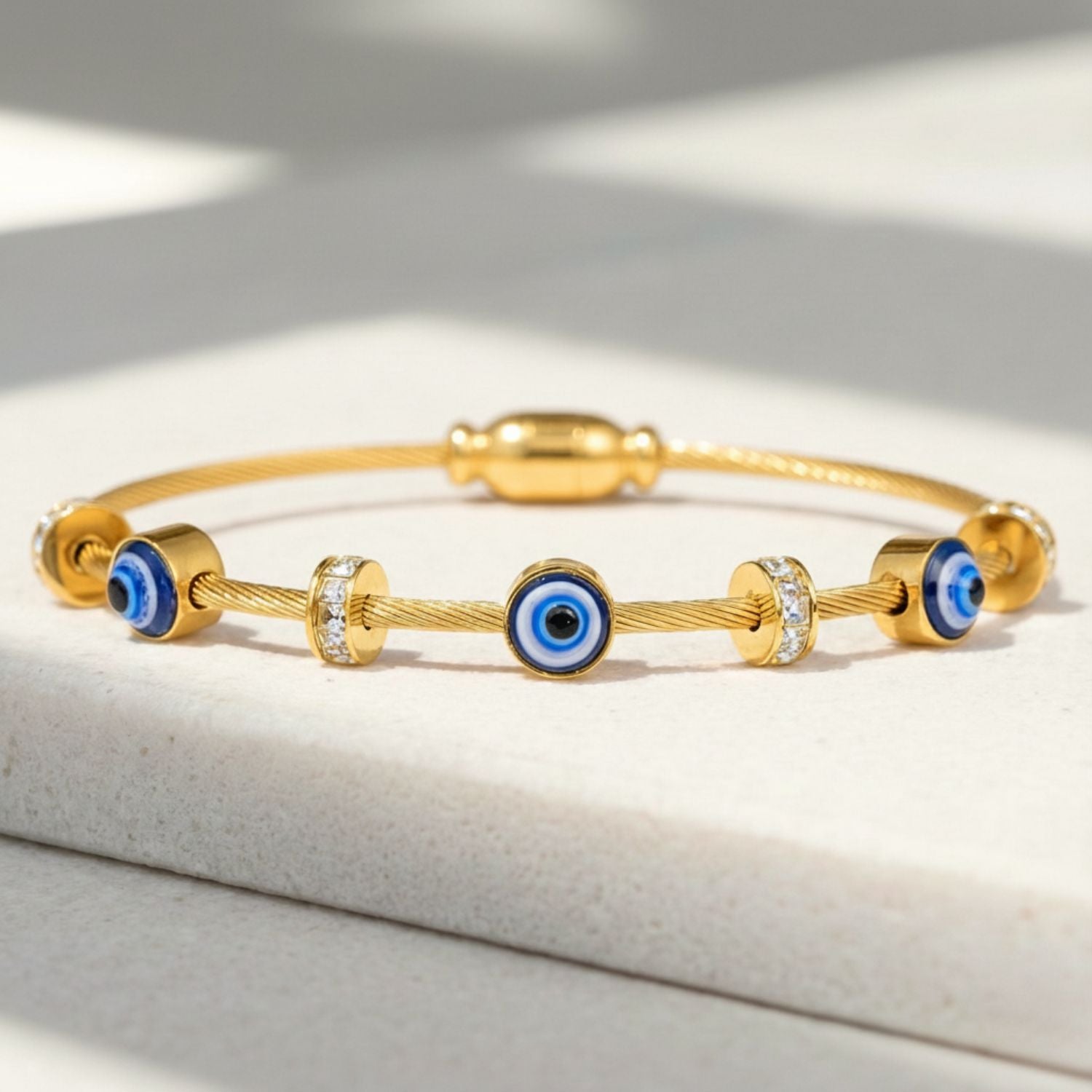 gold evil eye